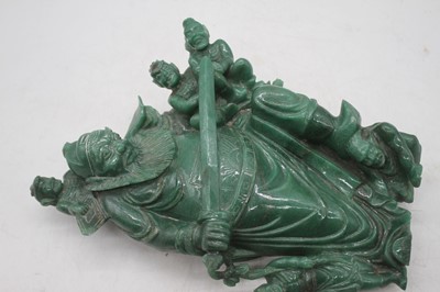 Lot 249 - A Chinese ? green polished hardstone figure...