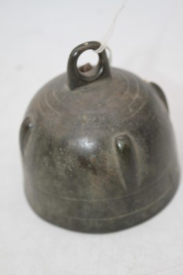 Lot 256 - An Eastern bronze bell, of dome form, h.9.5cm