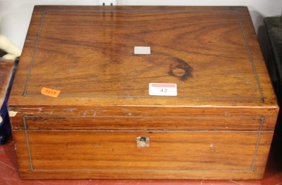 Lot 42 - A Victorian walnut and pewter strung workbox...