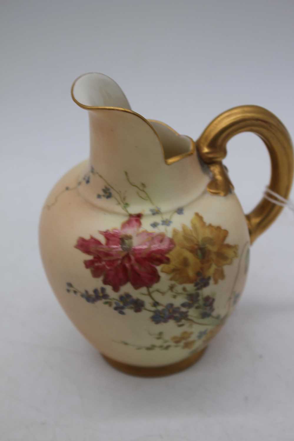 Lot 261 - A Royal Worcester blush ivory cleft jug,...
