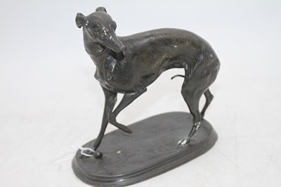 Lot 215 - A bronze model of a greyhound, signed PJ Mene...