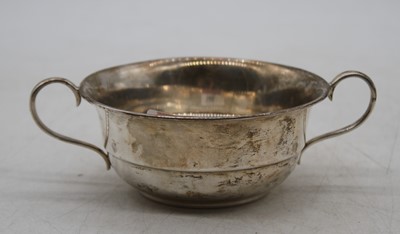 Lot 280 - A George V silver twin handled bowl, dia.11cm,...