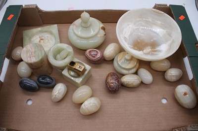 Lot 64 - A collection of onyx items, to include table...