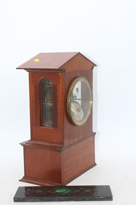 Lot 110 - A walnut cased mantel clock, having a circular...