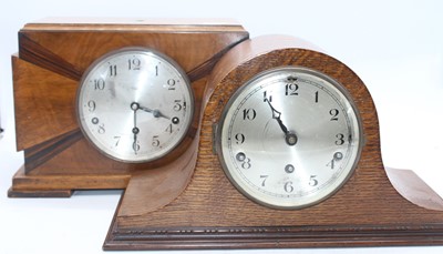 Lot 111 - An Art Deco walnut cased mantel clock, the...