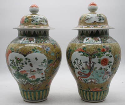 Lot 117 - A pair of Chinese export vases and covers,...