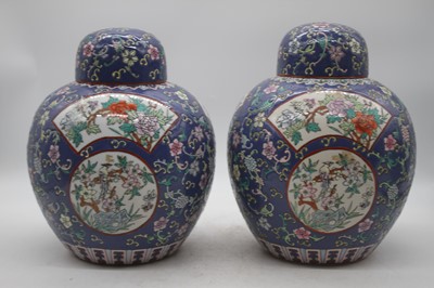 Lot 120 - A pair of Chinese export jars and covers, each...