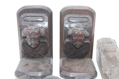 Lot 134 - A pair of late 19th century oak bookends, each...