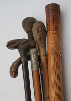 Lot 150 - A military swagger stick, the nickel cap with...