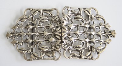 Lot 349 - A continental cast white metal belt buckle, 12cm