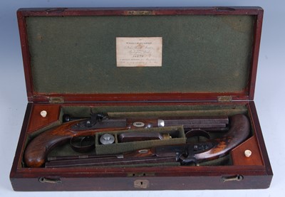 Lot 51 - A cased pair of 40-bore percussion duelling...