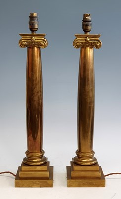 Lot 2375 - A pair of 20th century heavy brass table lamps,...