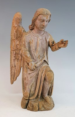 Lot 2341 - An 18th century carved pine figure of an angel,...