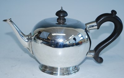 Lot 2165 - A George V silver bachelors teapot, of bullet...