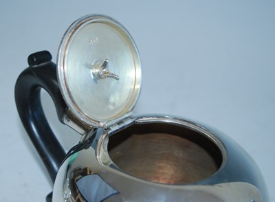 Lot 2165 - A George V silver bachelors teapot, of bullet...