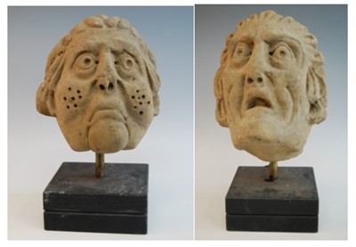 Lot 2340 - Two carved sandstone heads, probably 17th...