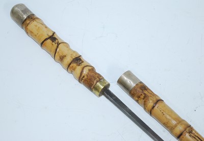 Lot 127 - An Edwardian bamboo sword stick, having a 70cm...