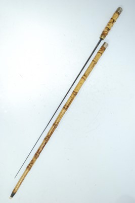 Lot 127 - An Edwardian bamboo sword stick, having a 70cm...