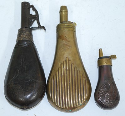 Lot 391 - An early 20th century brass powder flask, of...