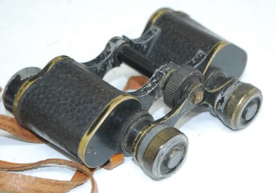 Lot 156 - A pair of WW I private purchase binoculars, in...
