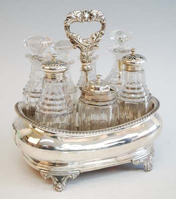 Lot 2130 - A George III seven-bottle silver cruet set,...