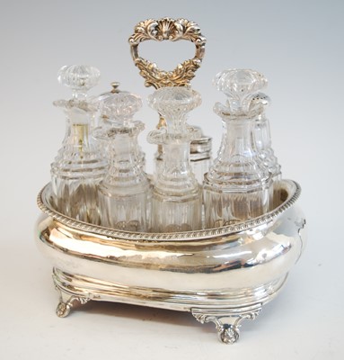 Lot 2130 - A George III seven-bottle silver cruet set,...
