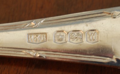 Lot 2176 - An Elizabeth II cased silver cutlery suite, in...