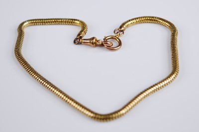 Lot 2227 - A yellow metal snake link bracelet, unmarked...