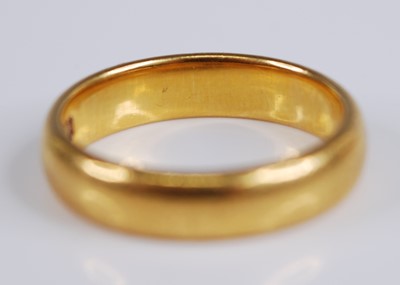 Lot 2230 - A 22ct gold wedding band, 6.5g, sponsor A&W,...
