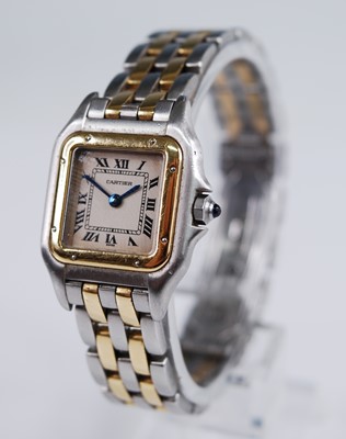 Lot 2334 - A lady's Cartier 18ct gold and steel Panthere...