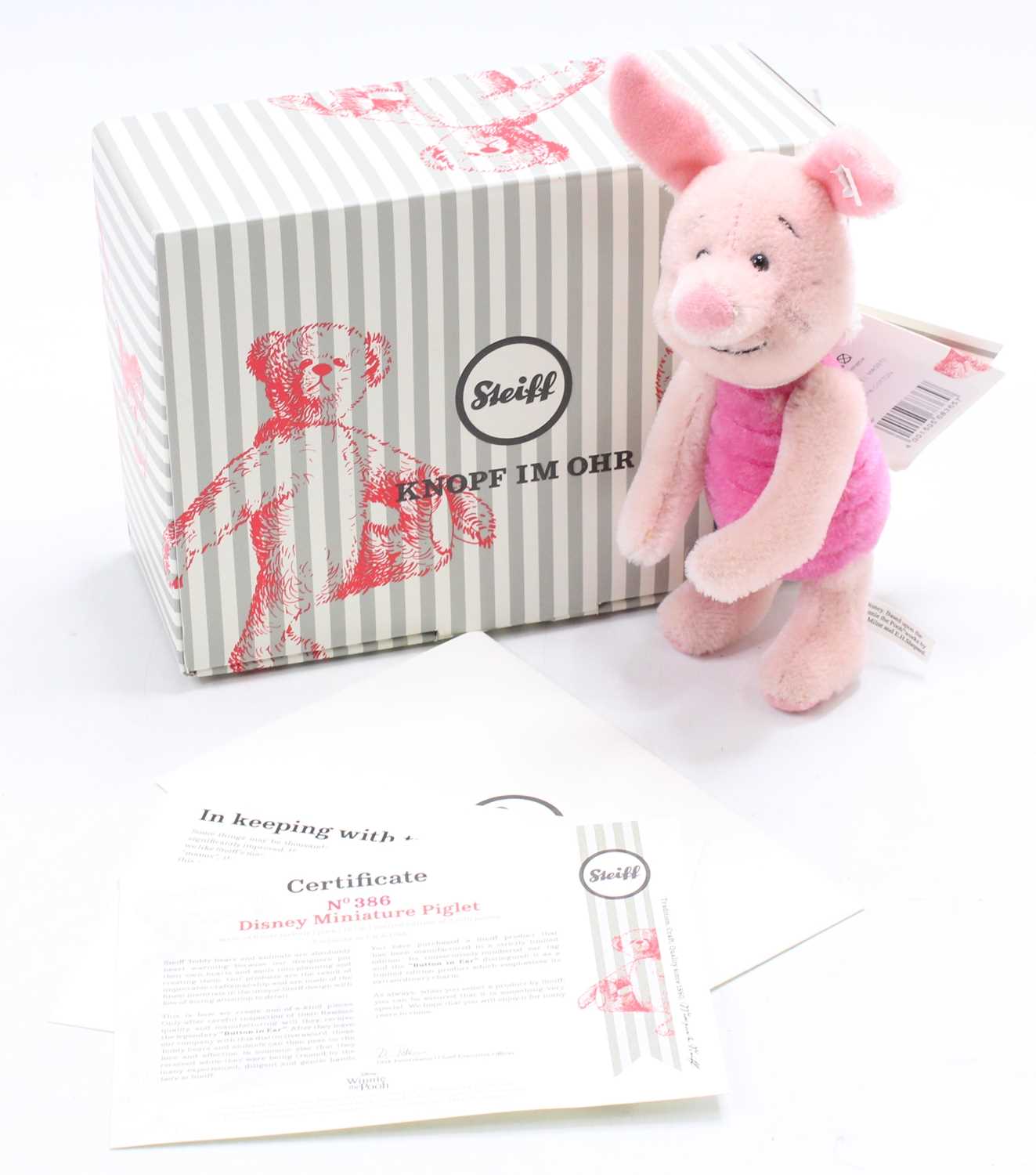 Lot 1744 - Steiff Winnie the Pooh Group, 3 examples to...