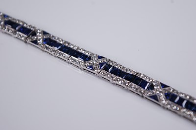 Lot 2245 - A white metal, sapphire and diamond Art Deco...