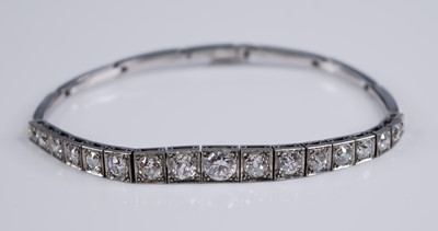 Lot 2247 - A white metal diamond articulated line...