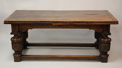 Lot 2549 - An antique oak drawleaf refectory table in the...