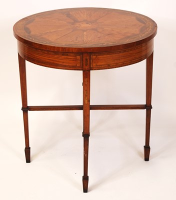 Lot 2569 - A circa 1900 French satinwood circular centre...