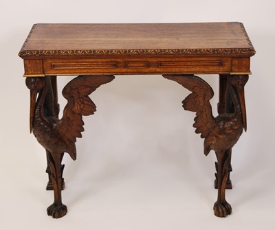 Lot 2567 - A circa 1900 carved oak hall table, having egg...