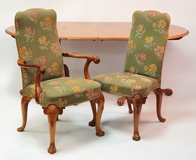 Lot 2574 - An early 20th century figured walnut dining...