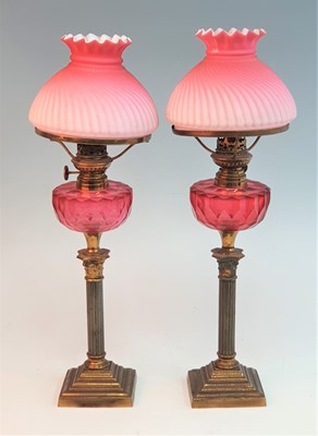 Lot 2376 - A pair of Victorian brass oil lamps, the...