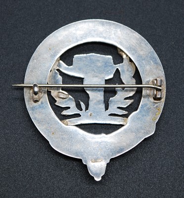 Lot 25 - A 20th century white metal clan badge,...