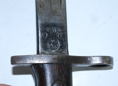 Lot 133 - A 1913 pattern Remington bayonet, the 43cm...