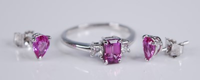 Lot 2259 - An 18ct white gold, pink sapphire and diamond...