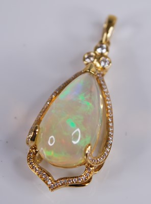 Lot 2217 - An 18ct gold Ethiopian opal set pendant, the...