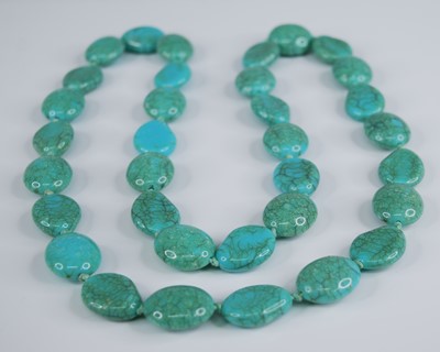 Lot 309 - A turquoise necklace, comprising 34 oval...