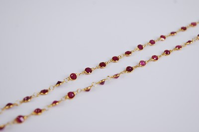 Lot 2301 - A contemporary yellow metal ruby...