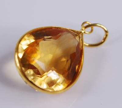 Lot 2240 - A contemporary yellow metal citrine set...