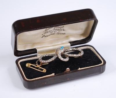 Lot 2192 - An Edwardian yellow metal diamond set snake...