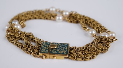 Lot 2270 - A vintage 18ct gold triple Byzantine link...