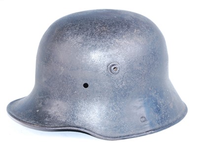 Lot 104 - A German M1916 steel helmet, lacking liner.