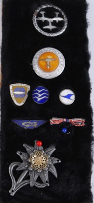 Lot 237 - A small collection of German badges and...