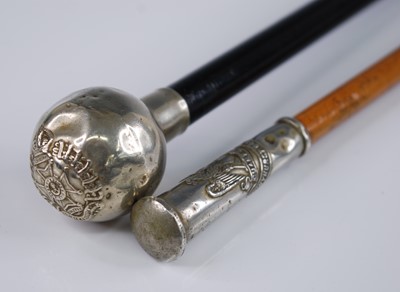 Lot 234 - An early 20th century swagger stick, having an...